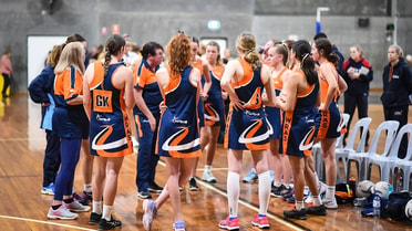 Team huddle of netball players
