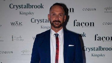 Damian Smith in front of Facon branded backdrop