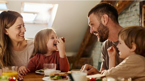 family at table having breakfast