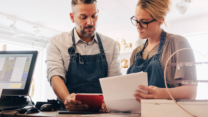 Business owners at computer