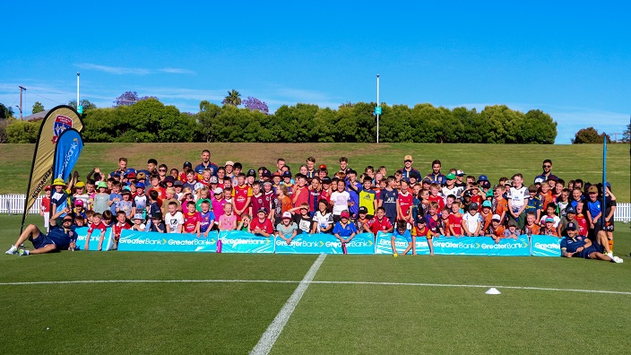 Group shot of kids and players