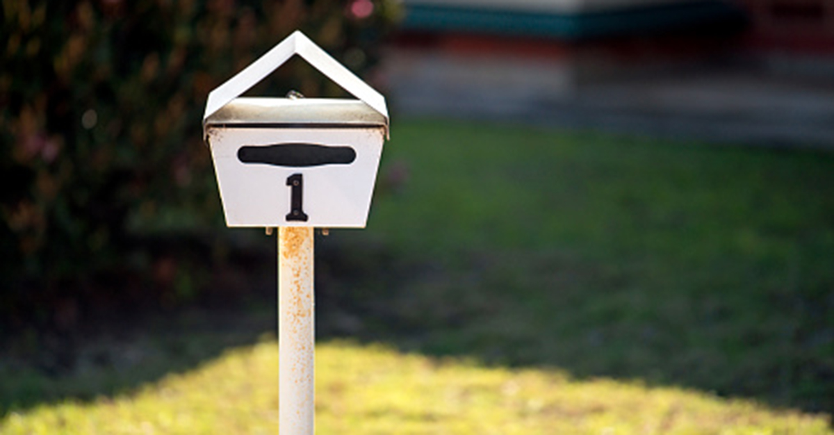 White letterbox with a number one